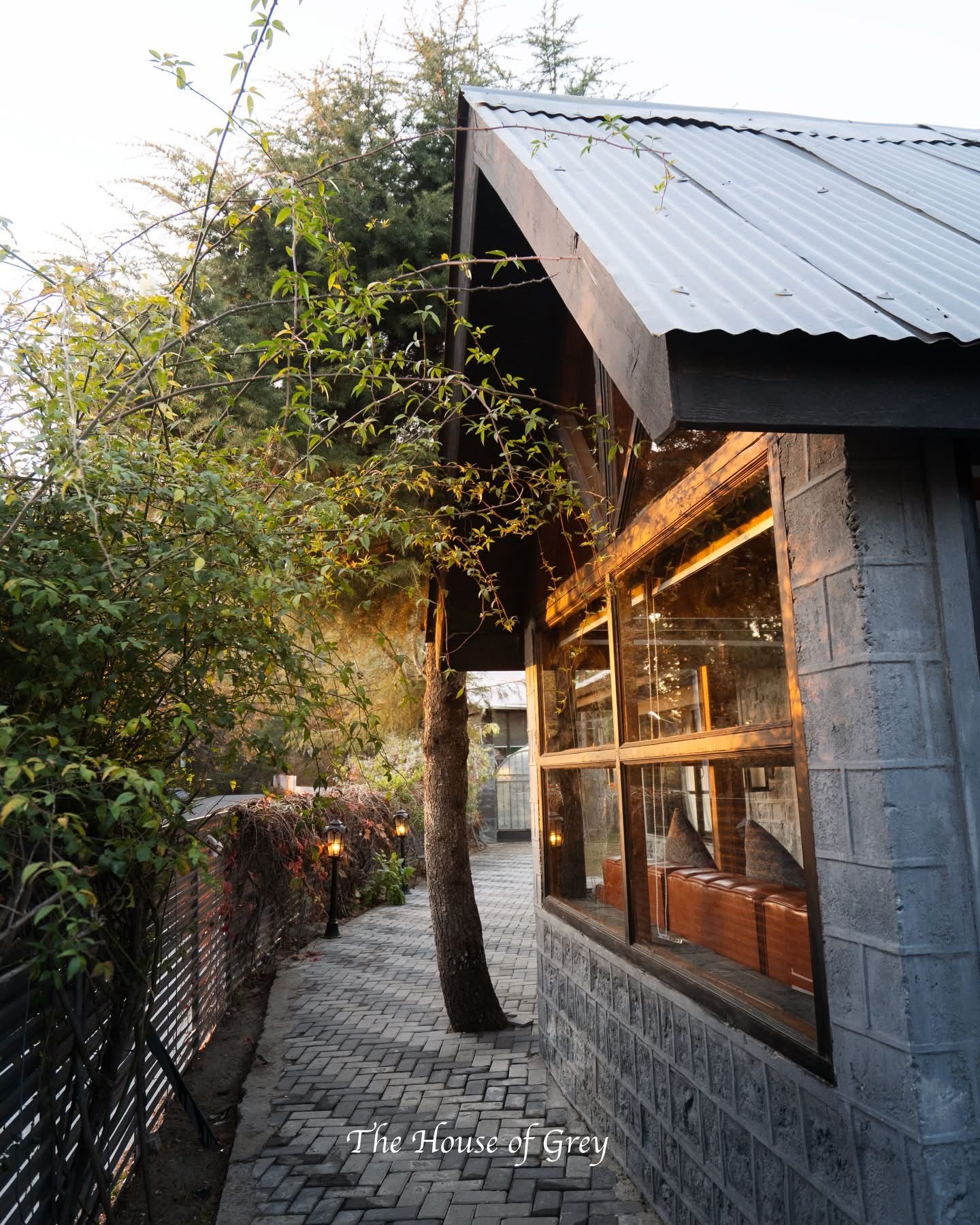Lantern lit pathway leading to villa entrance